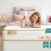 Eco Kids Girl reading with BedBuyer logo