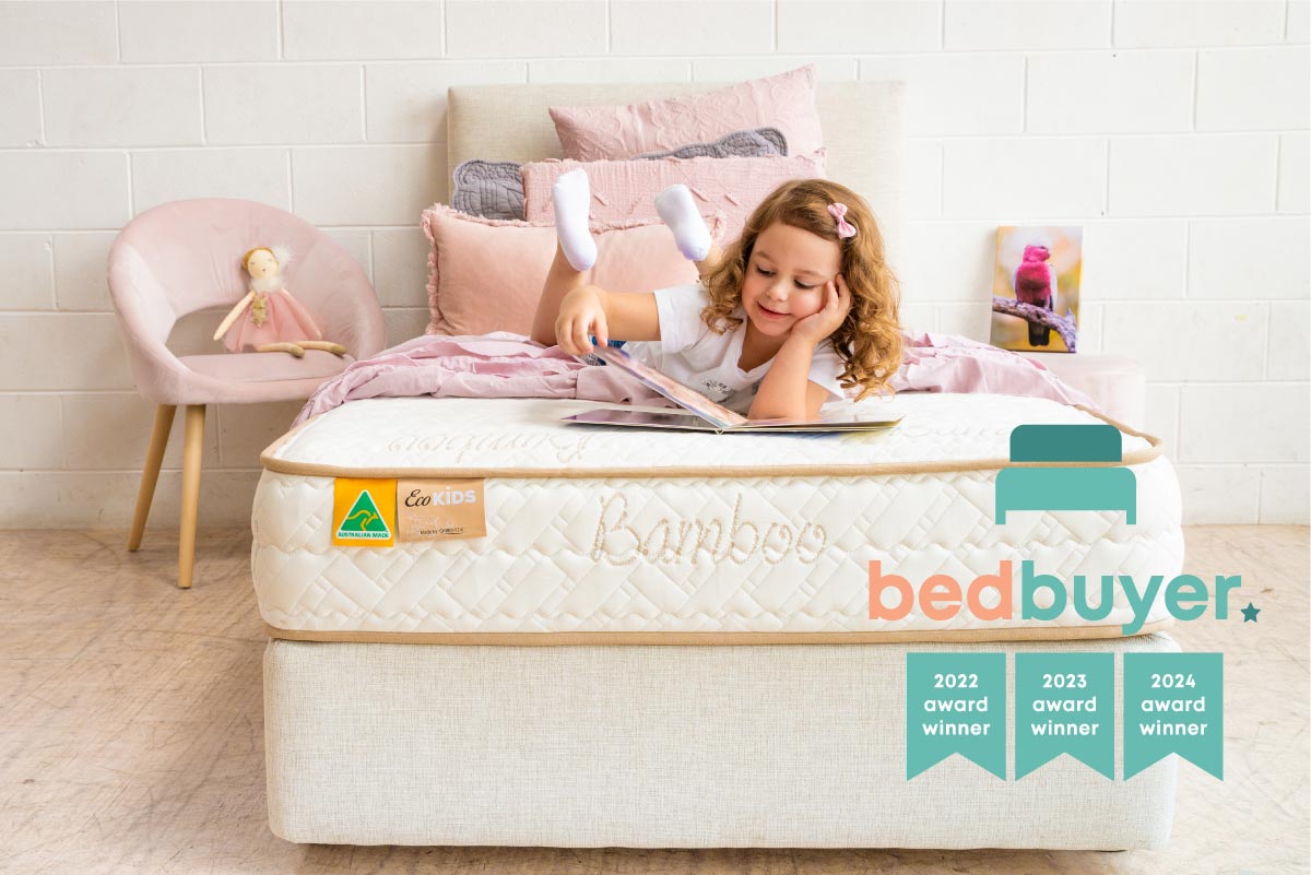 Eco Kids Girl reading with BedBuyer logo